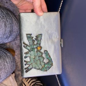 BARNEY’S NEW YORK gray clutch